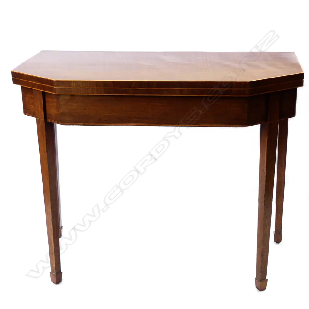 An Edwardian mahogany card table Image 1++