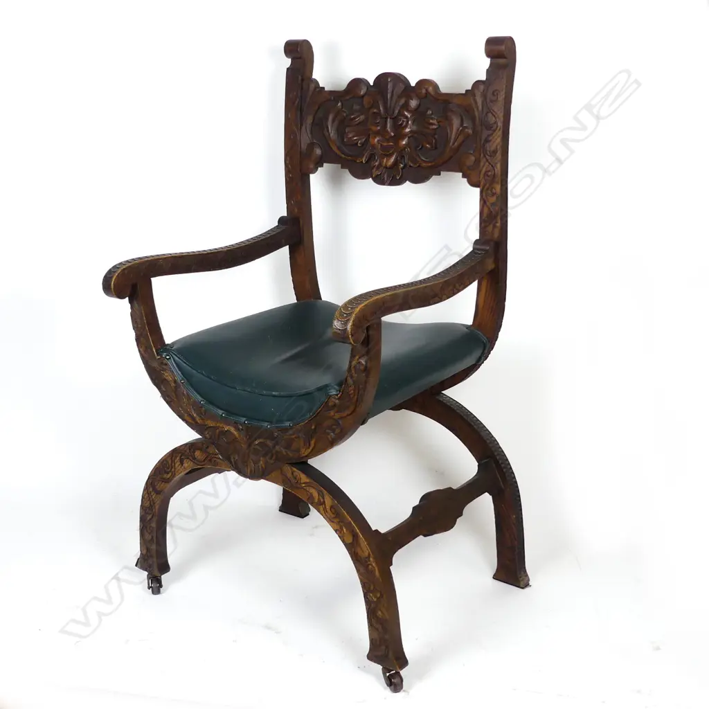 A Victorian oak curule chair Image 1++