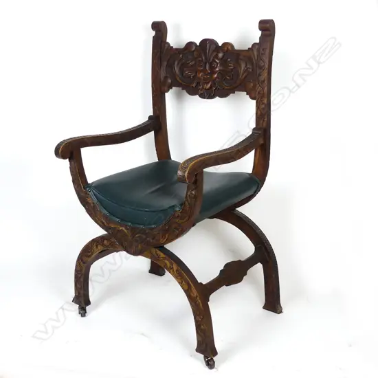 A Victorian oak curule chair