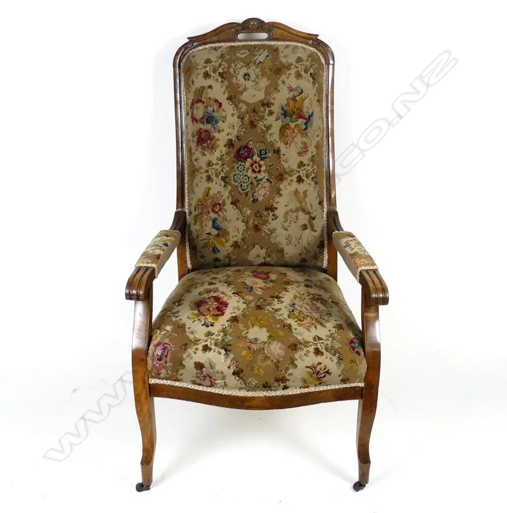 A Victorian mahogany high-back open elbow armchair Image 1++