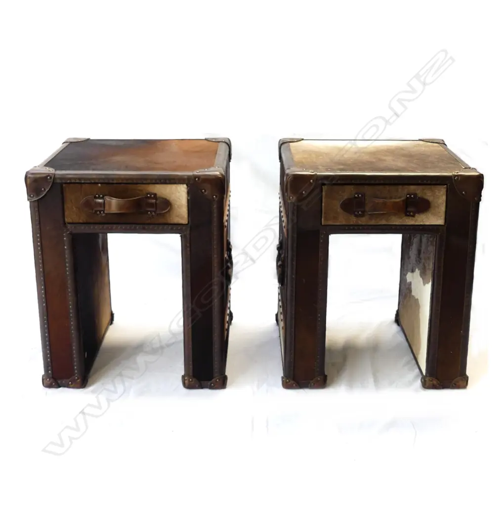 A pair of modern designer pony hide and leather side cabinets Image 1++