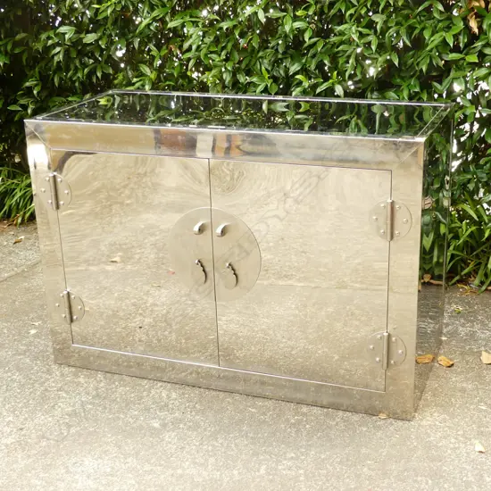 A contemporary polished steel sideboard