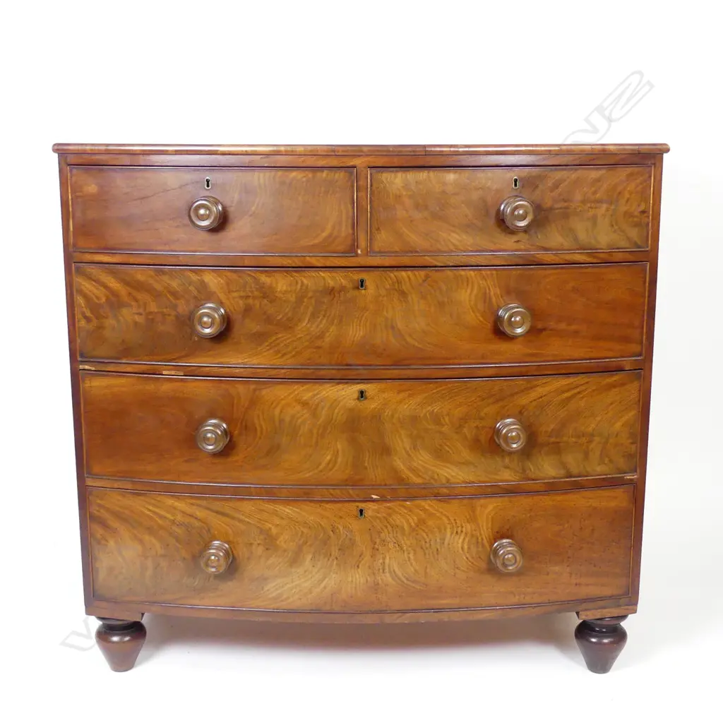A 19thC mahogany bowfront chest of five drawers Image 1++