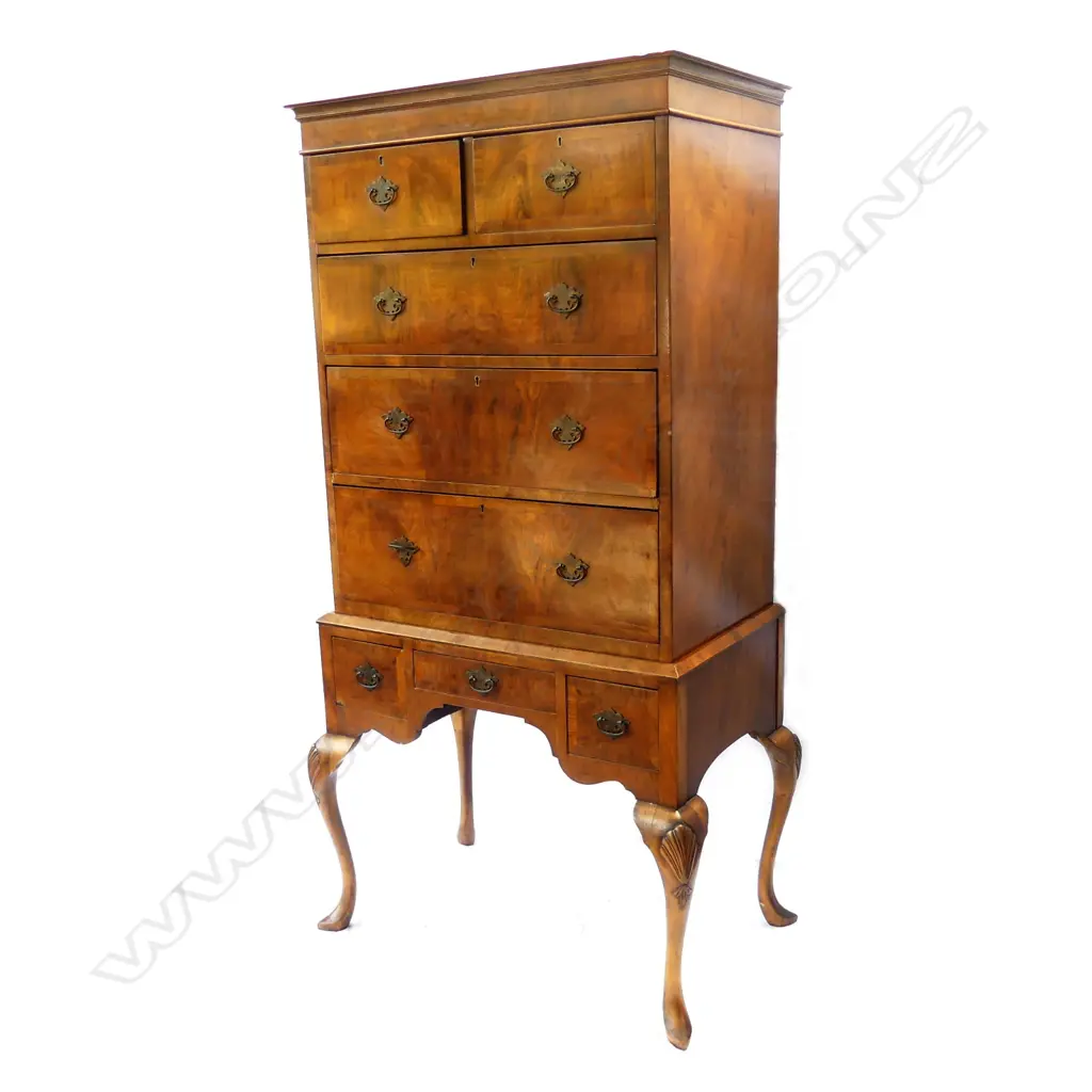 A vintage walnut Queen Anne style chest on stand Image 1++