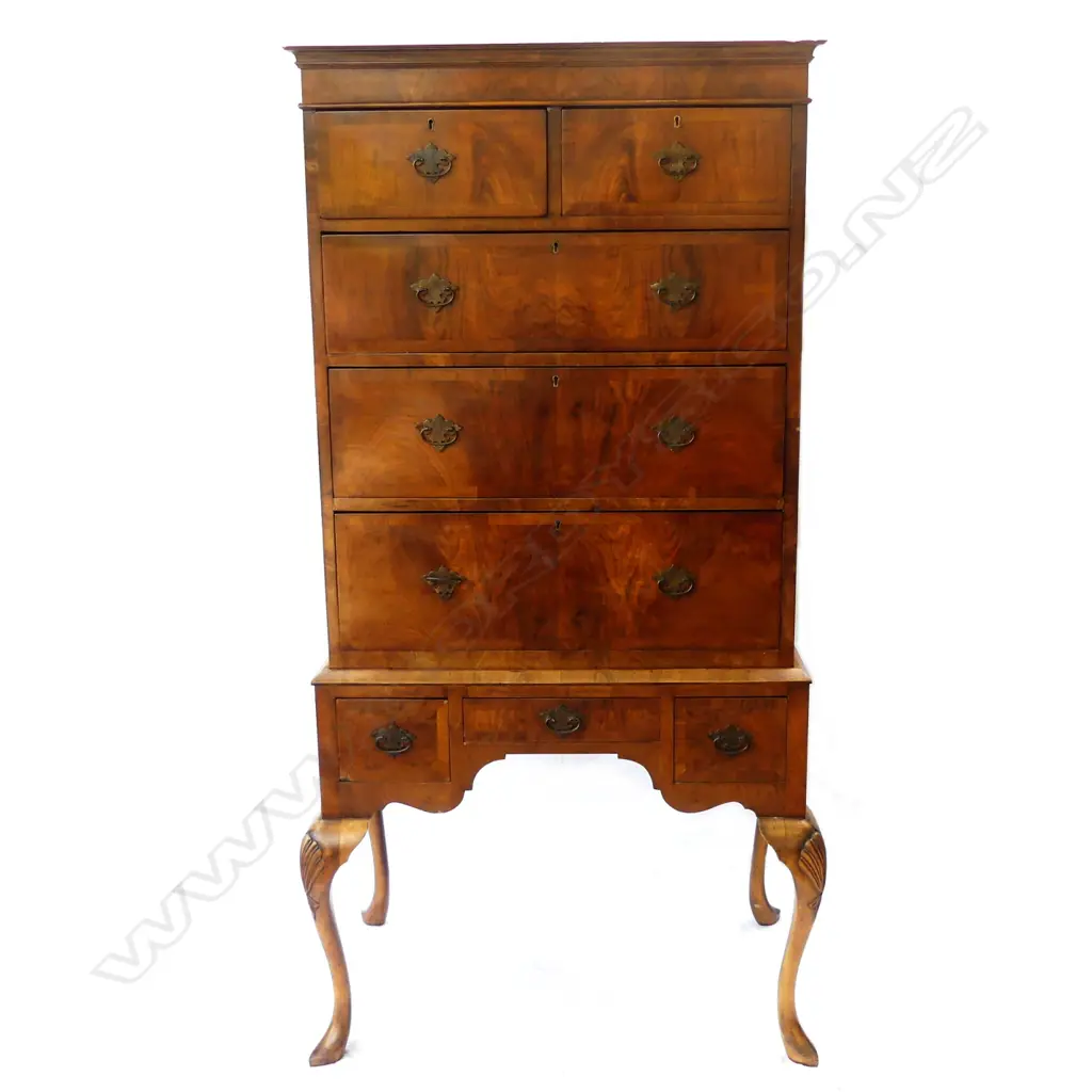 A vintage walnut Queen Anne style chest on stand Image 1++