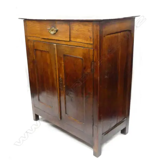 A small country style fruitwood sideboard