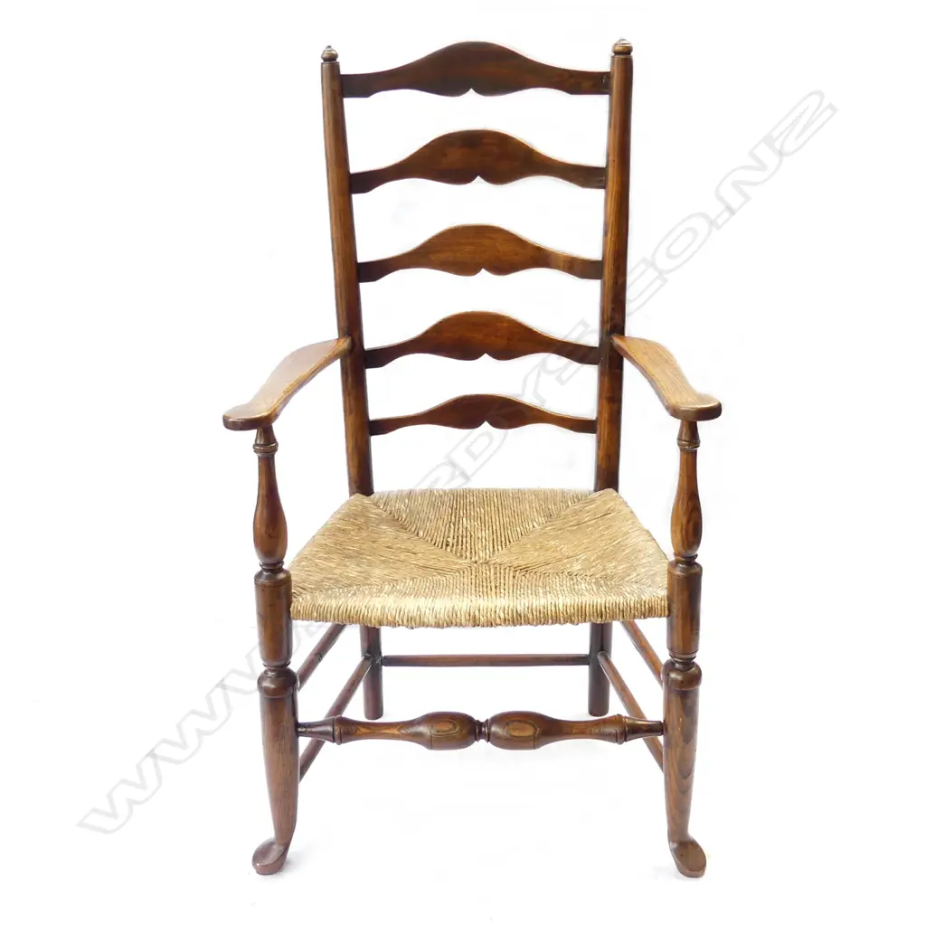 An oak country ladder back carver chair Image 1++