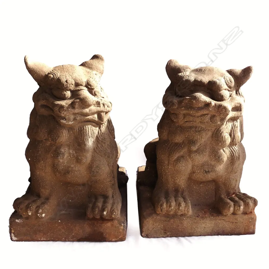 A pair of stoneware foo dogs Image 1++