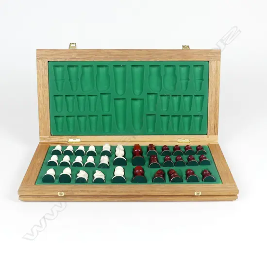 A boxed ivory chess set