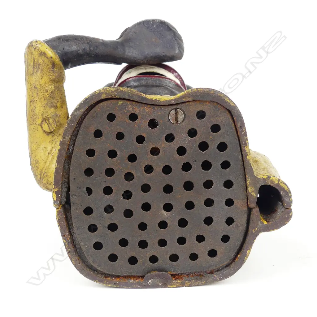 A vintage Dinah cast iron money bank Image 1++