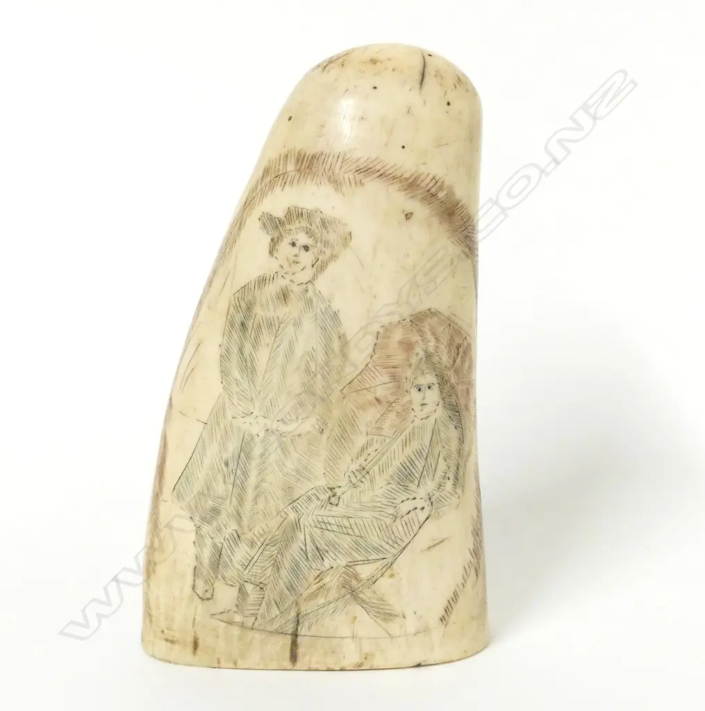 An old tooth with scrimshaw decoration Image 1++