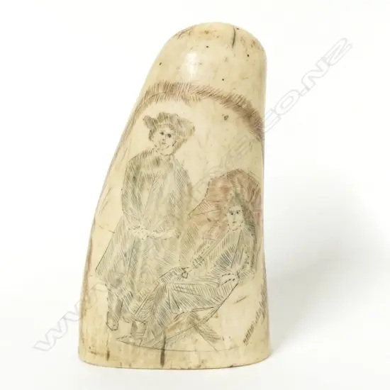 An old tooth with scrimshaw decoration