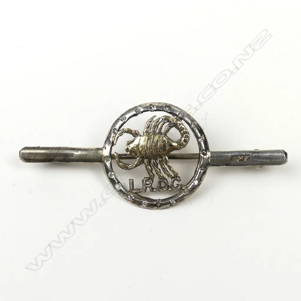 A rare WWII L.R.D.G. (Long Range Desert Group) 9ct.gold and silver Sweetheart brooch Image 1++