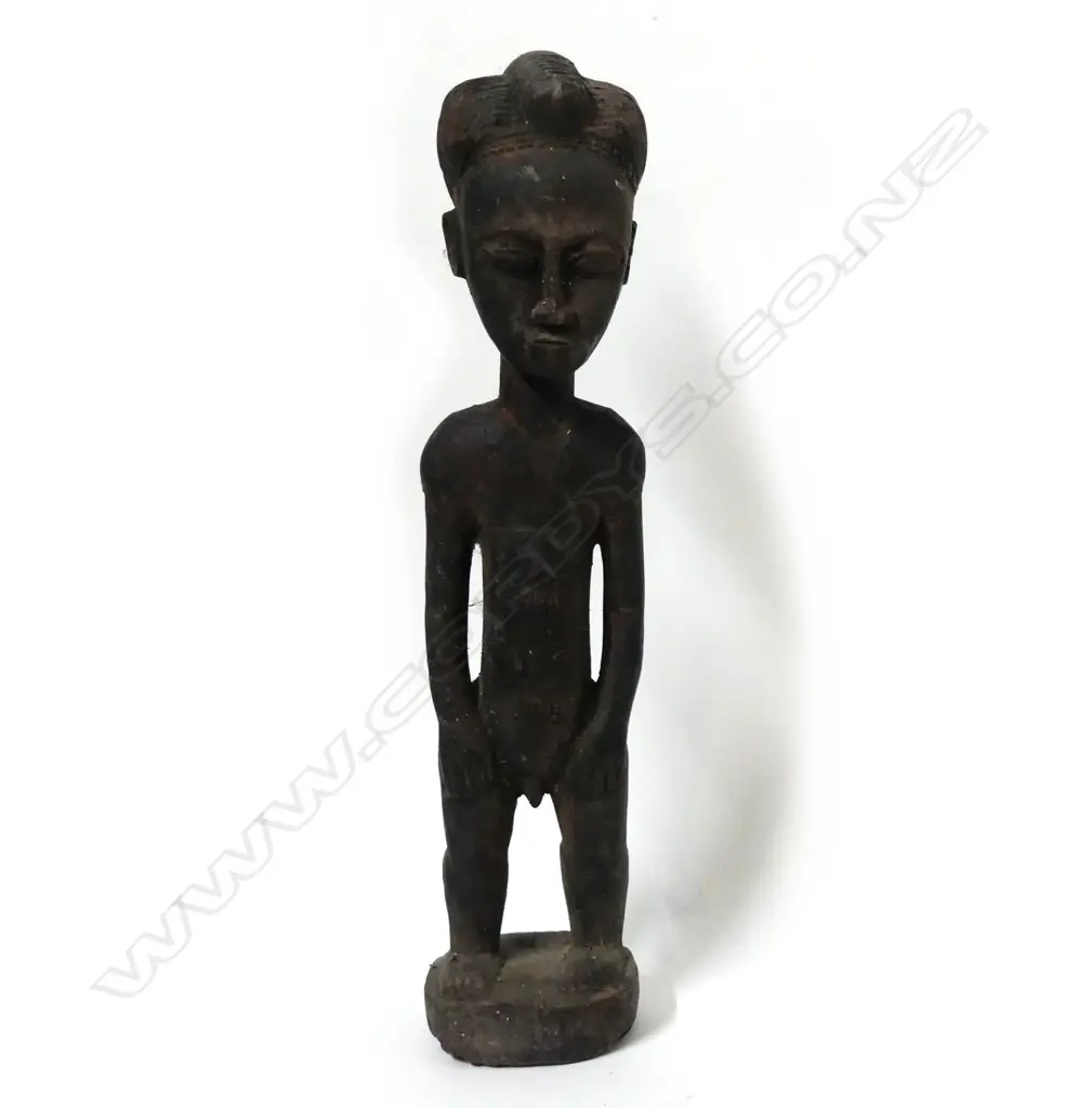 A Nigerian tribal wood figure Image 1++