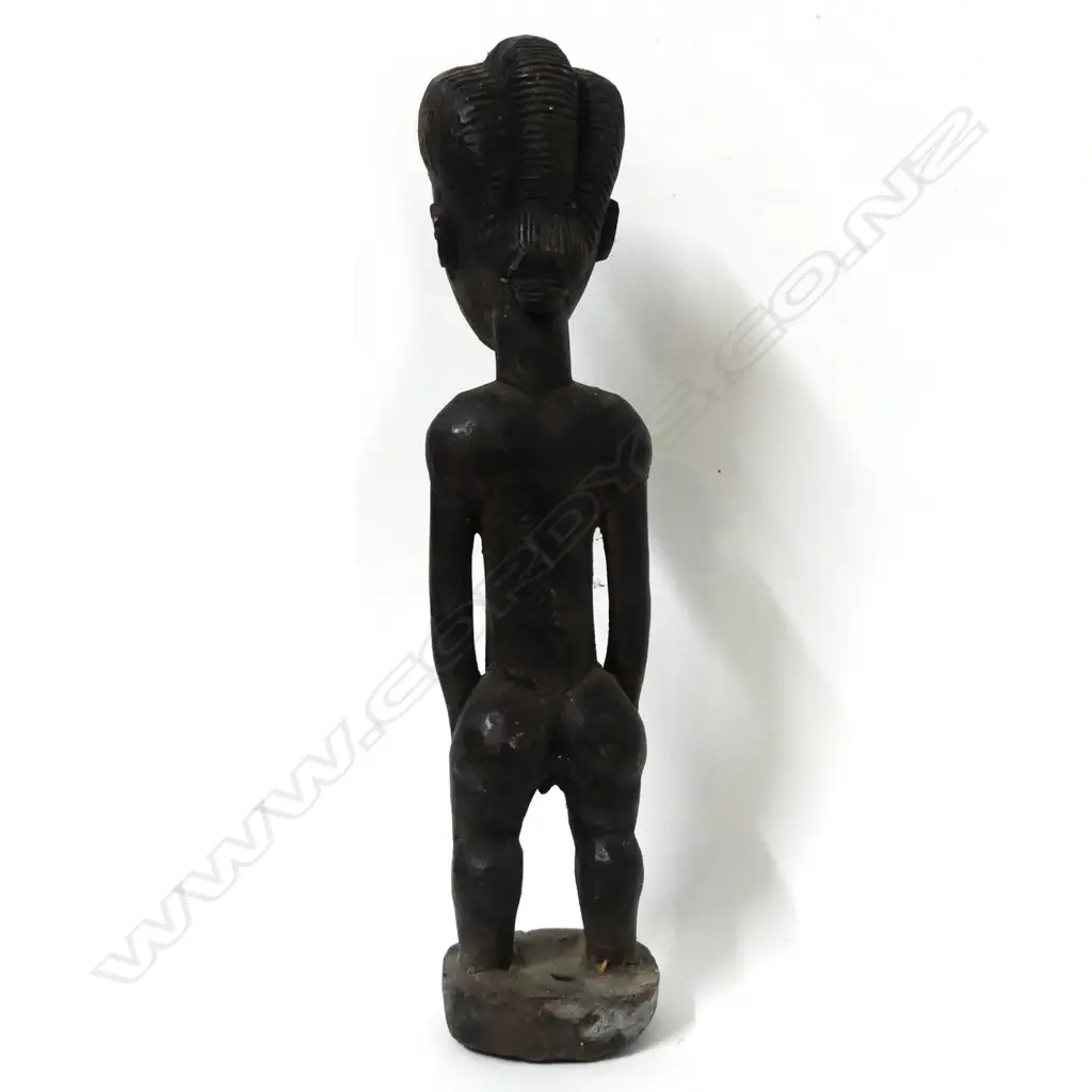 A Nigerian tribal wood figure Image 1++