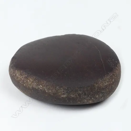 A rare Maori napping stone