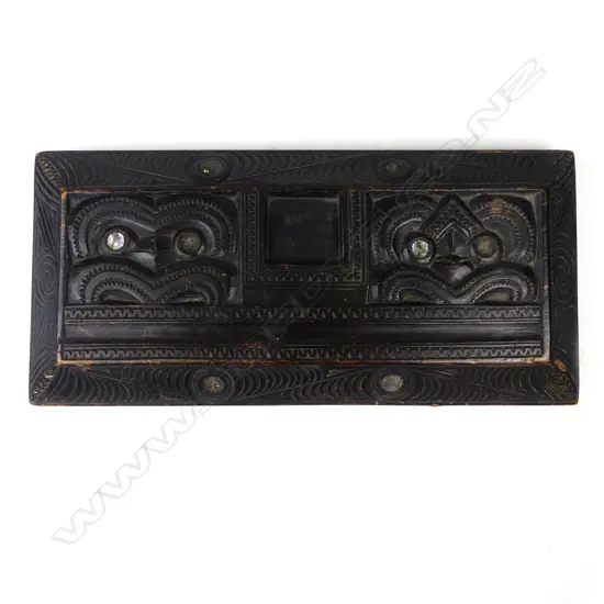 An early 20thC Māori carved inkstand,