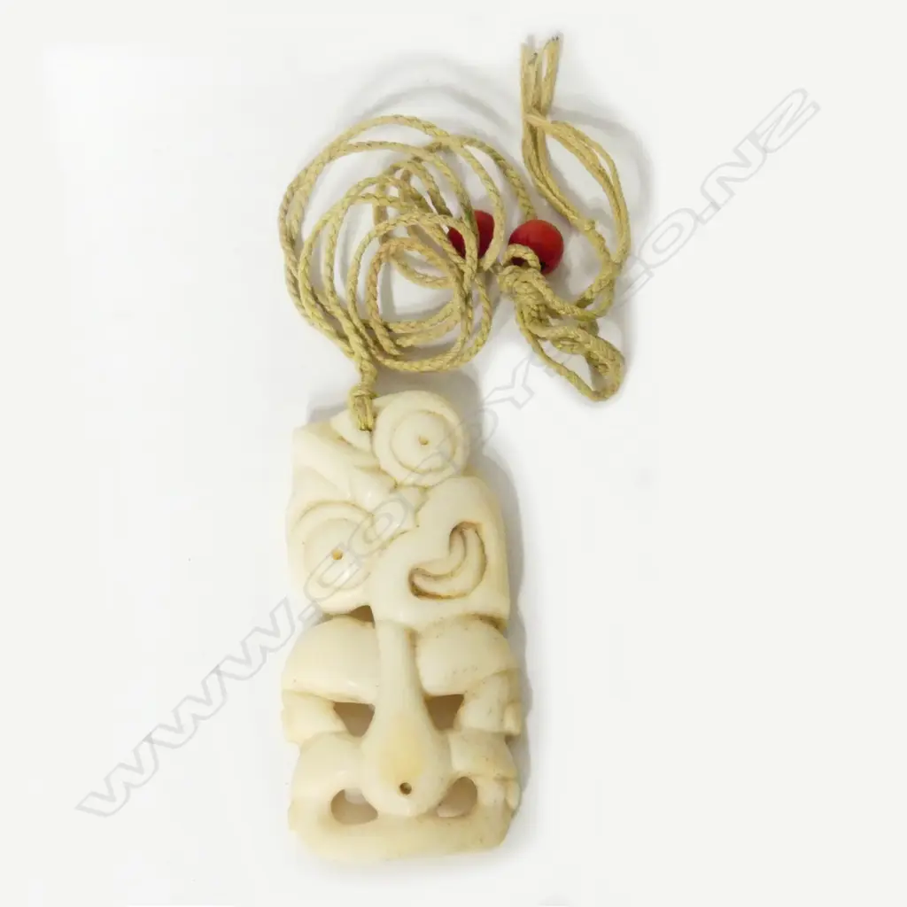 A vintage bone tiki Image 1++