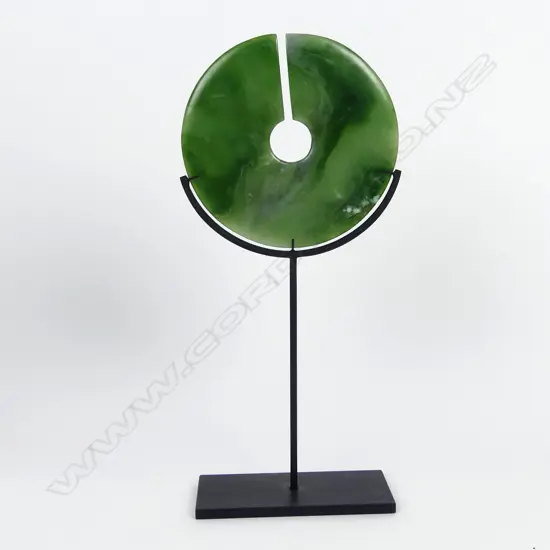 A Chris Charteris pounamu disc