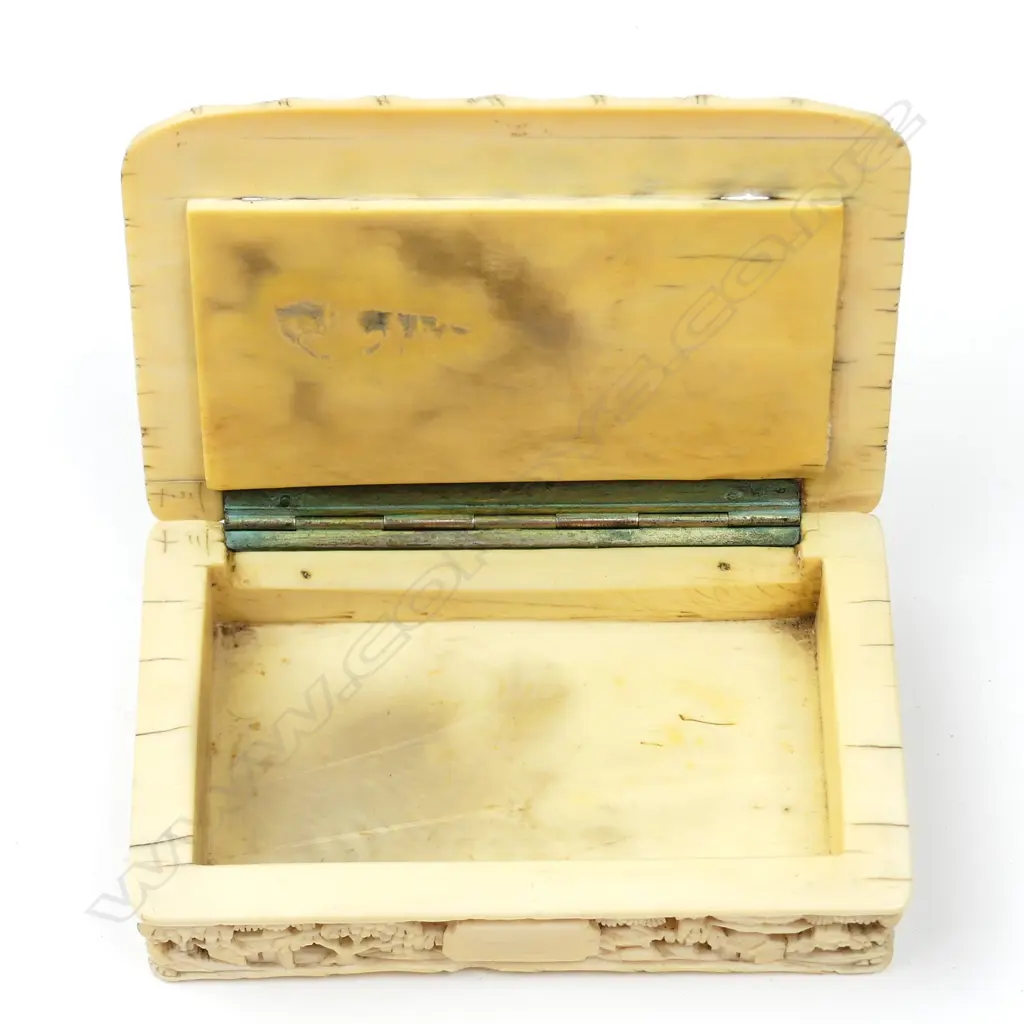 An old Chinese intricately carved ivory box Image 1++