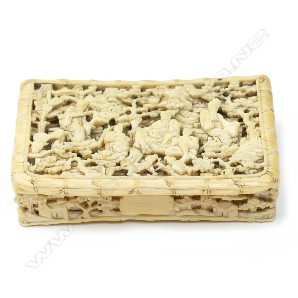 An old Chinese intricately carved ivory box Image 1++
