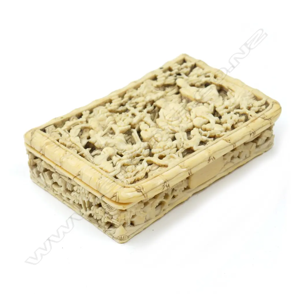 An old Chinese intricately carved ivory box Image 1++