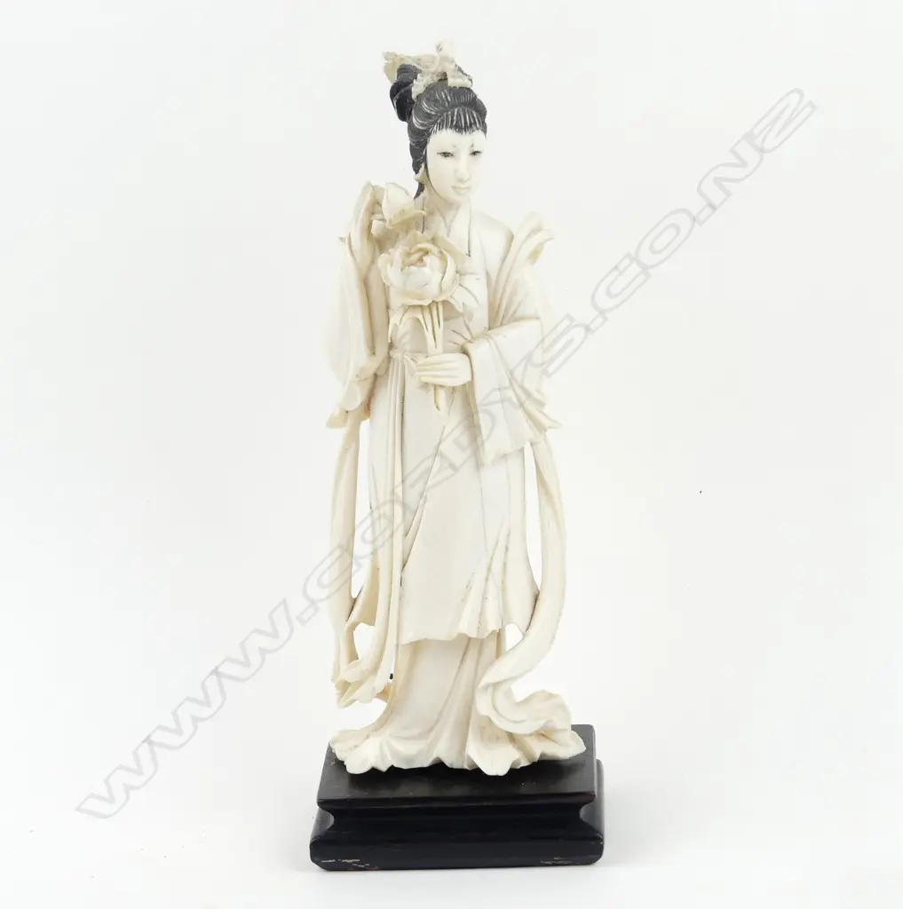 A Chinese ivory figurine of Kuanyin Image 1++