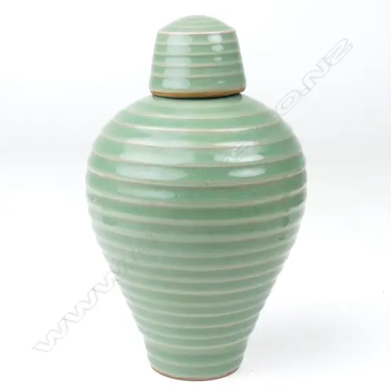 A Ming style Longquan celadon lidded jar