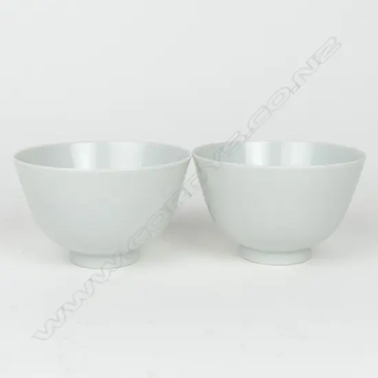 A pair of Imperial quality white glazed Chinese bowls