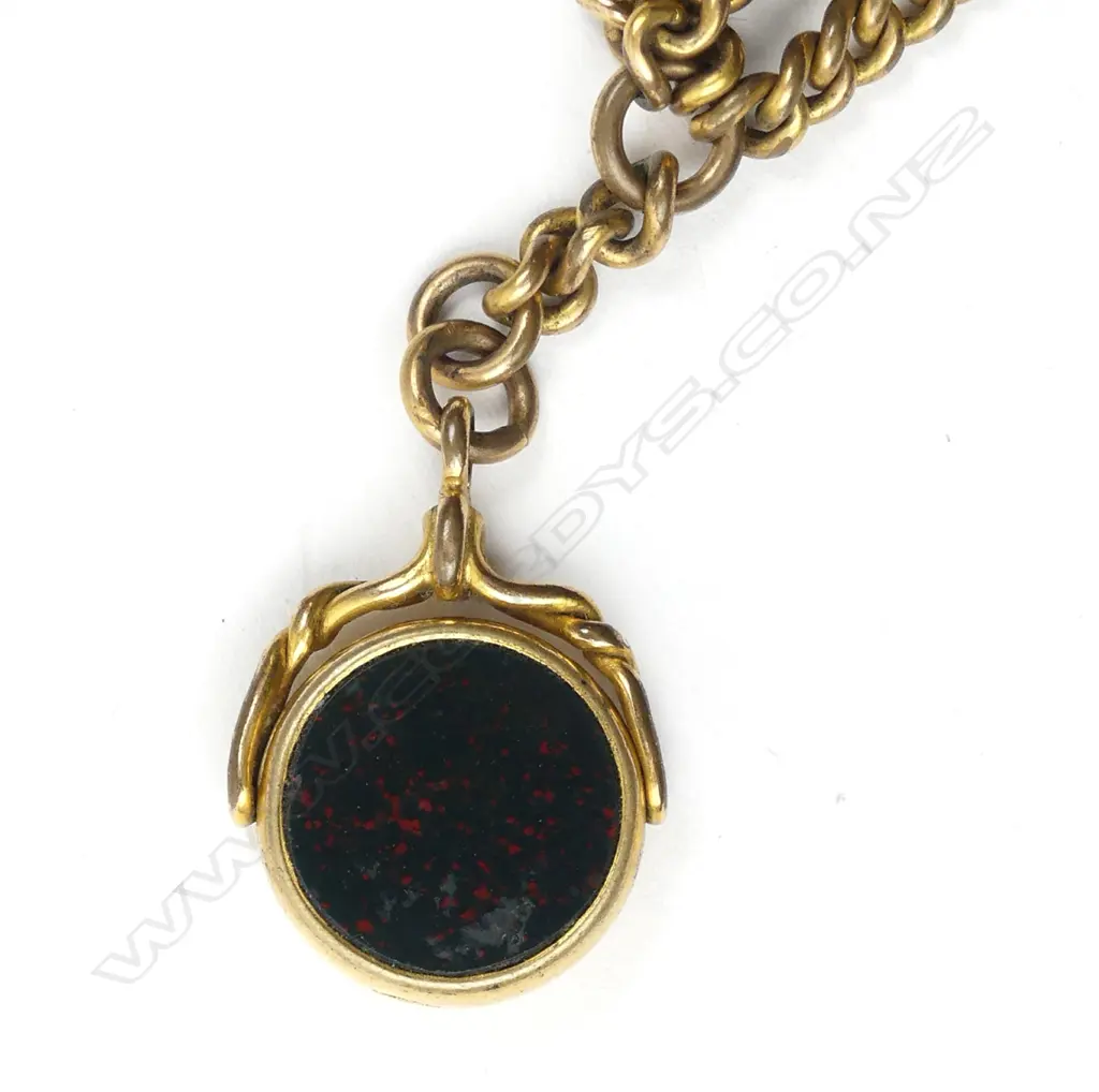 A late 19thC rolled gold curb link Albert chain Image 1++