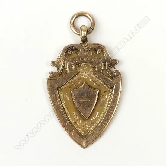 A 9ct. rose gold 1912 Auckland Rowing Club fob medallion