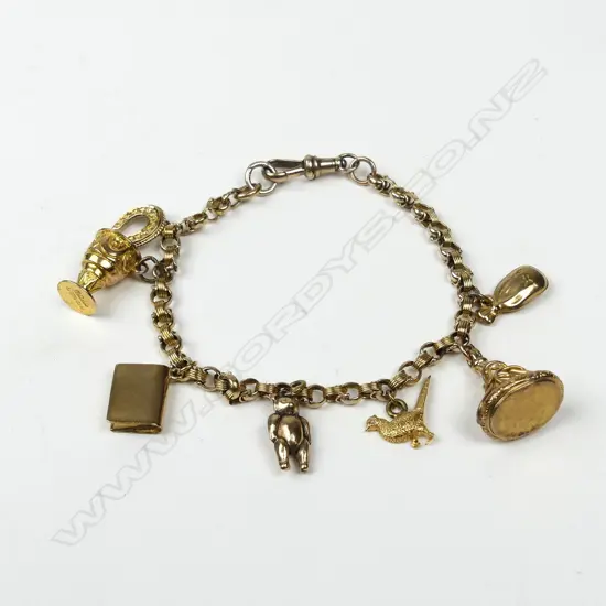 A vintage 9ct. yellow gold charm bracelet