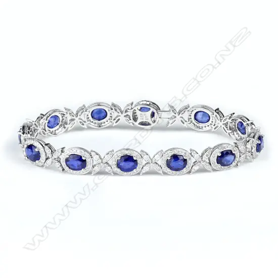 A 14ct white gold diamond and sapphire bracelet