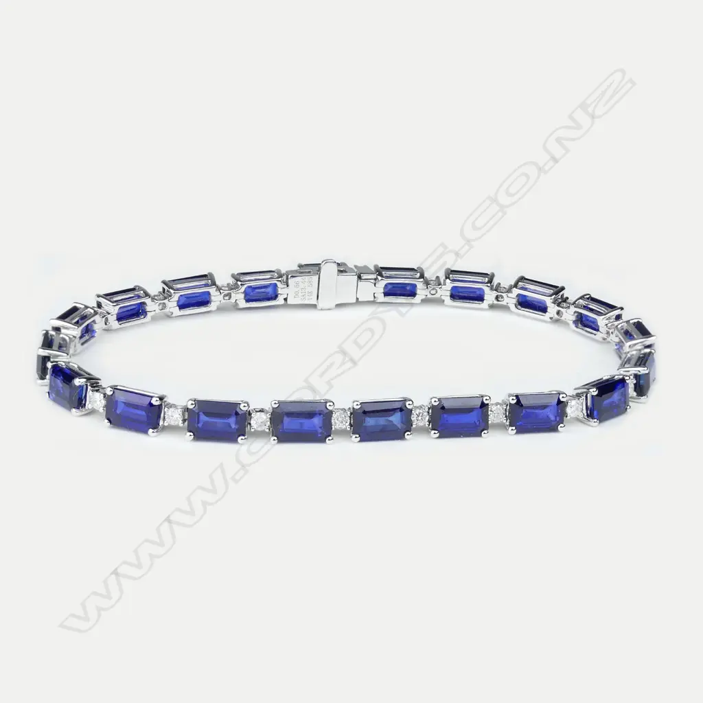 A 14ct white gold sapphire and diamond bracelet Image 1++