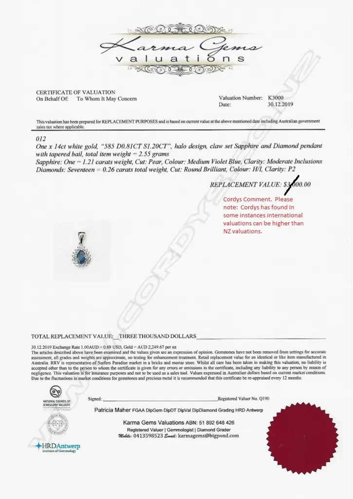 A 14ct white gold sapphire and diamond pendant Image 1++