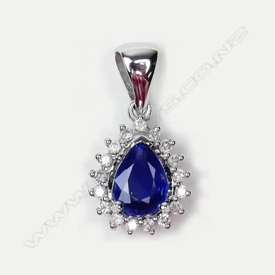 A 14ct white gold sapphire and diamond pendant