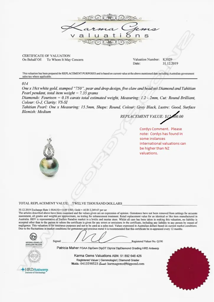 An 18ct white pearl and diamond pendant Image 1++