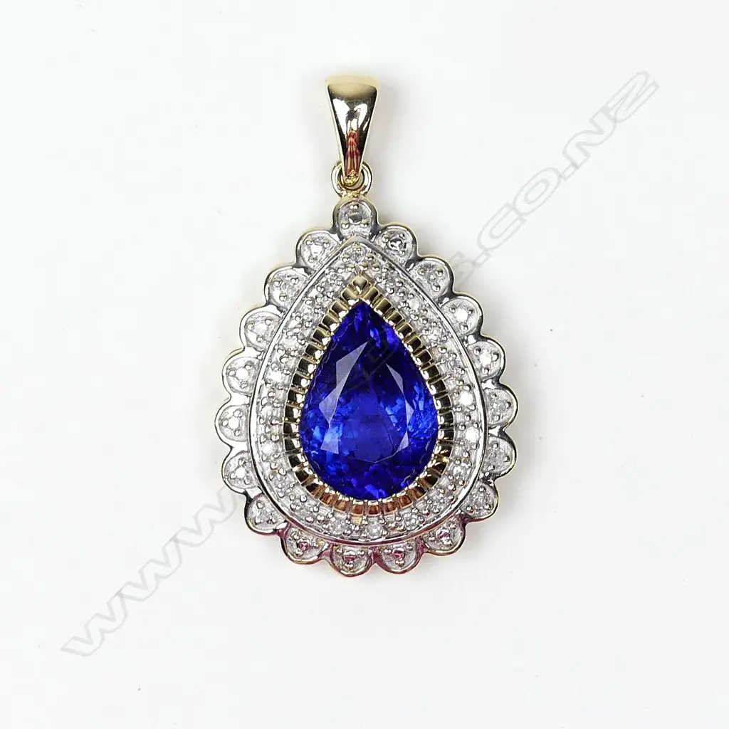 A 9ct gold tanzanite and diamond pendant Image 1++