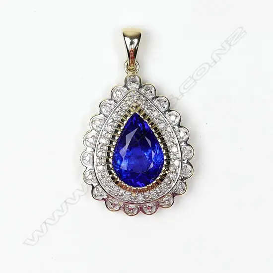 A 9ct gold tanzanite and diamond pendant