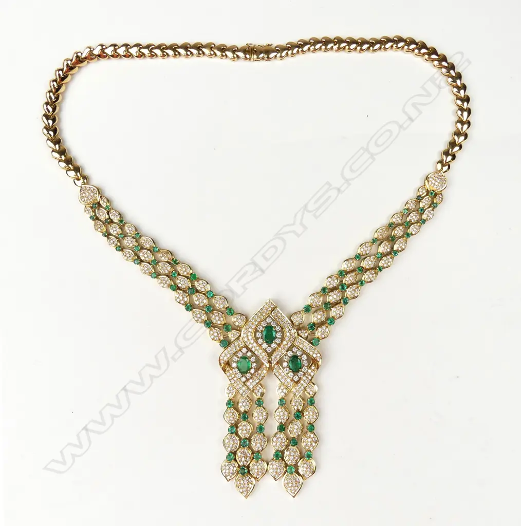 An impressive 18ct gold emerald and diamond necklace Image 1++