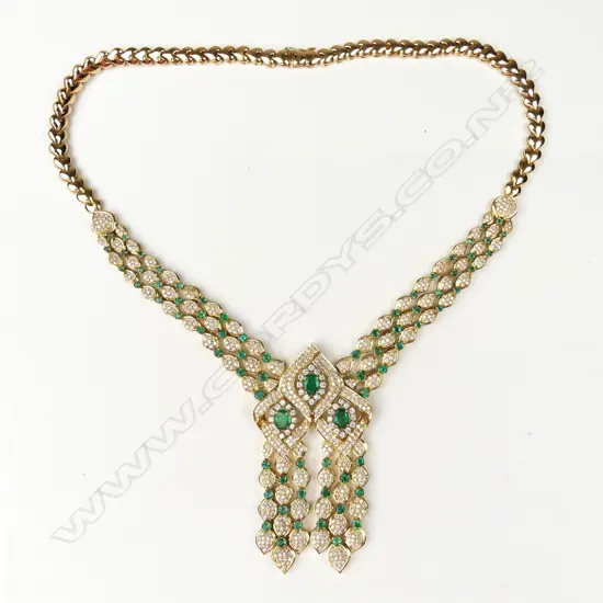 An impressive 18ct gold emerald and diamond necklace