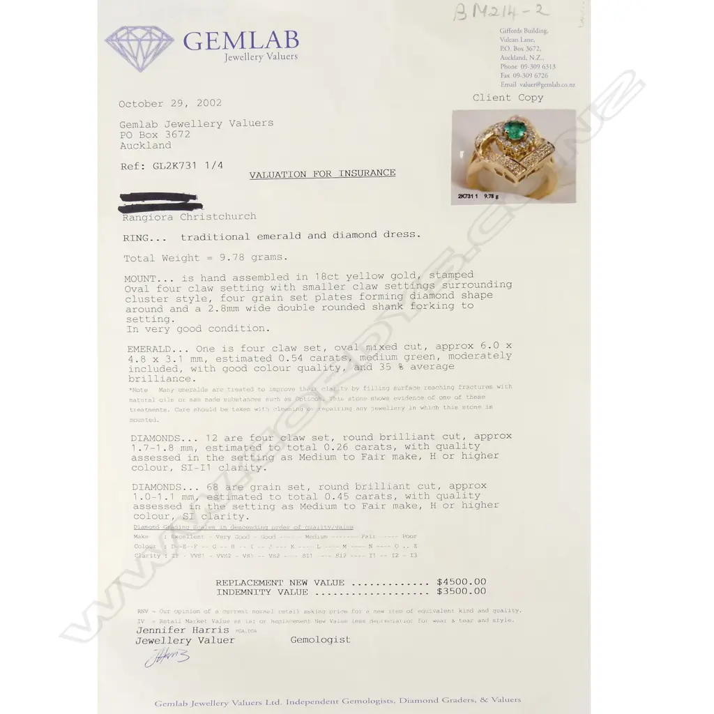 An 18ct gold emerald and diamond ring Image 1++