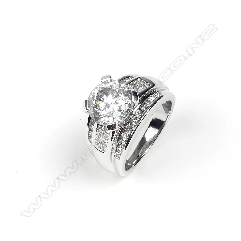 A 14ct white gold and 5.05ct diamond ring Image 1++