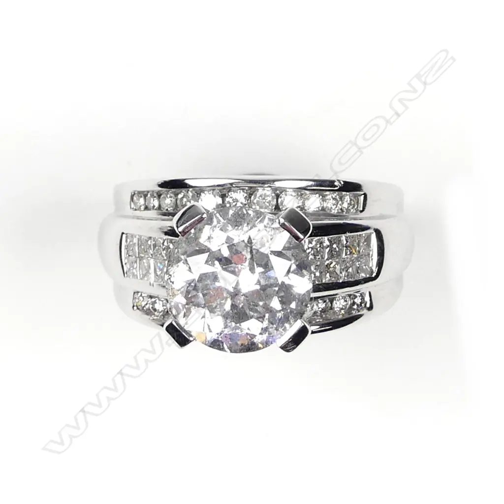 A 14ct white gold and 5.05ct diamond ring Image 1++