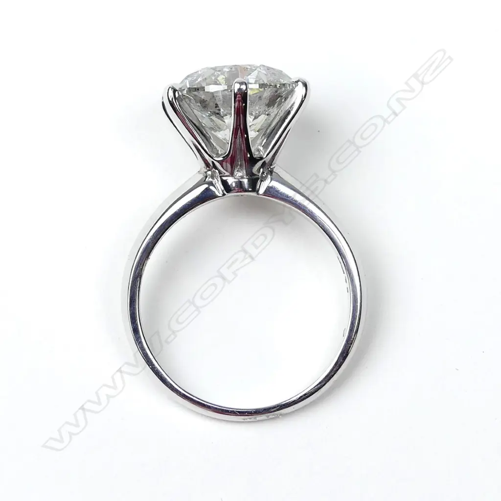 An 18ct white gold and 5.50ct diamond solitaire ring Image 1++