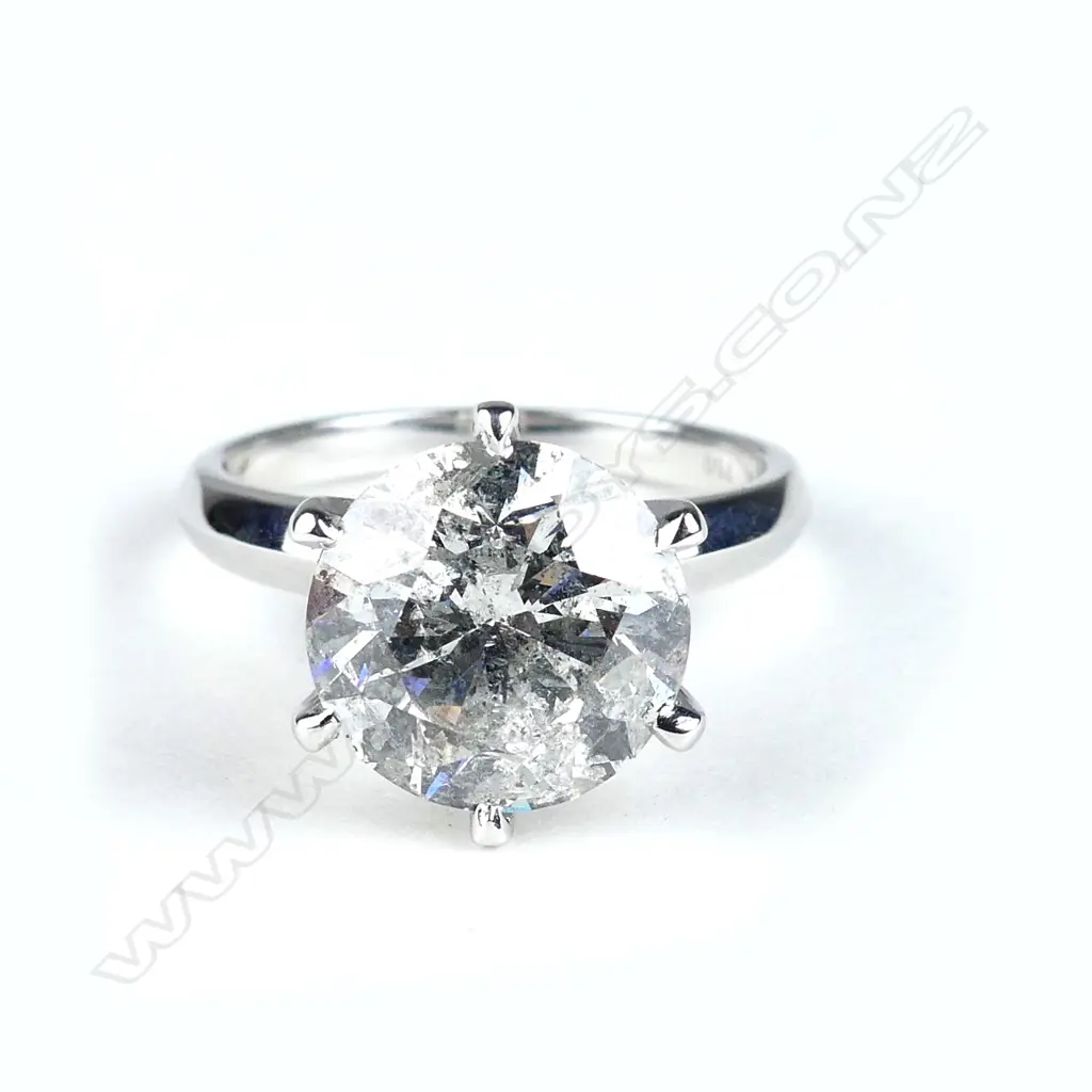 An 18ct white gold and 5.50ct diamond solitaire ring Image 1++