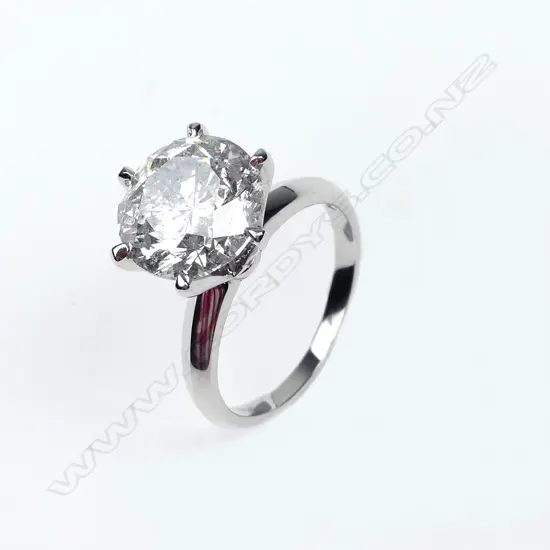 An 18ct white gold and 5.50ct diamond solitaire ring