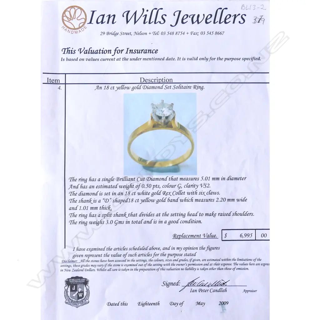 An 18ct gold solitaire diamond ring Image 1++