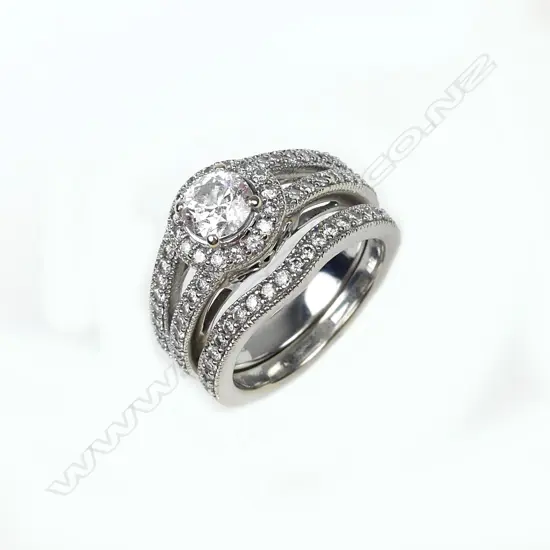 An 18ct white gold and diamond ring set