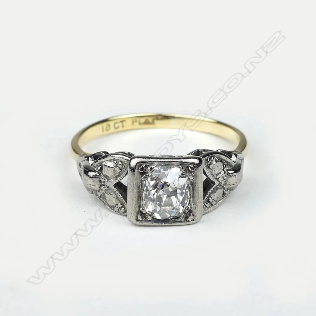 An estate 18ct gold and platinum diamond ring Image 1++